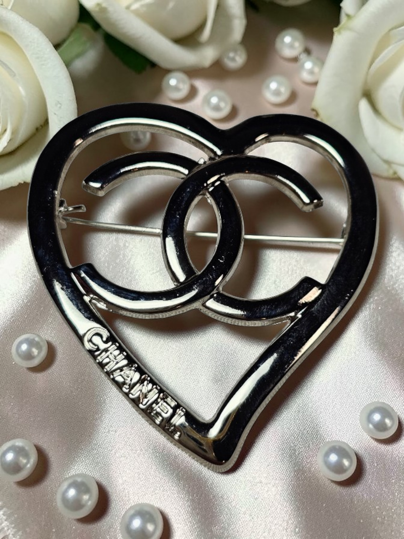 Silver Chanel logo charm pin Brooch