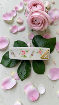 Prada White floral with Gold logo charm Hair Clip