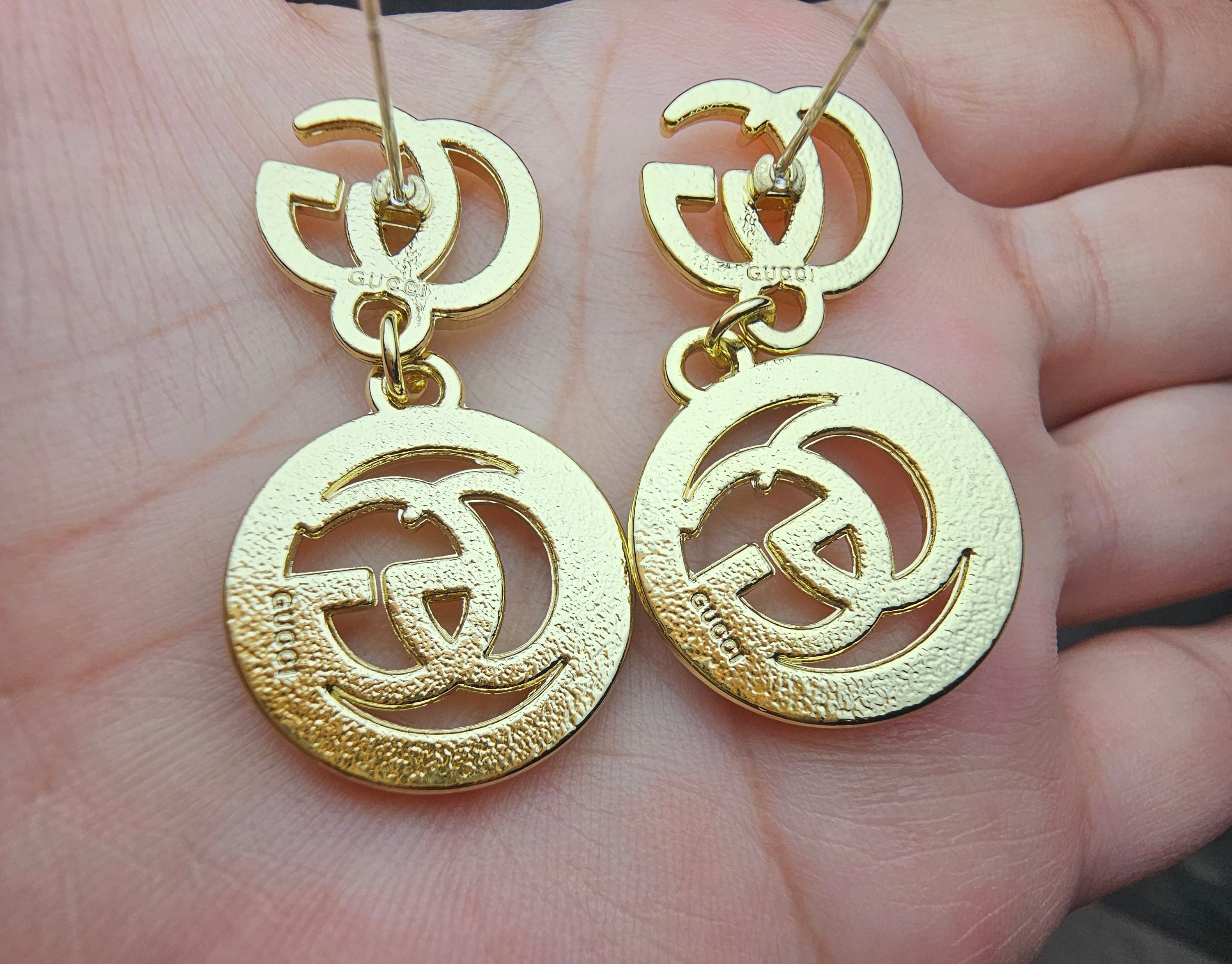 GG Logo charm Gold drop Earrings