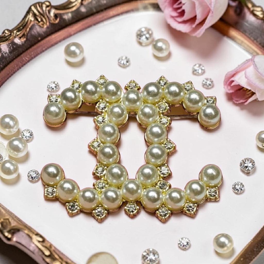 Gold and Continuous Pearl Charm Brooch