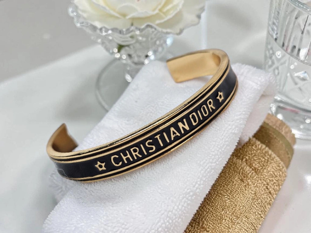 CD Logo Bracelet black and gold New 2026 version