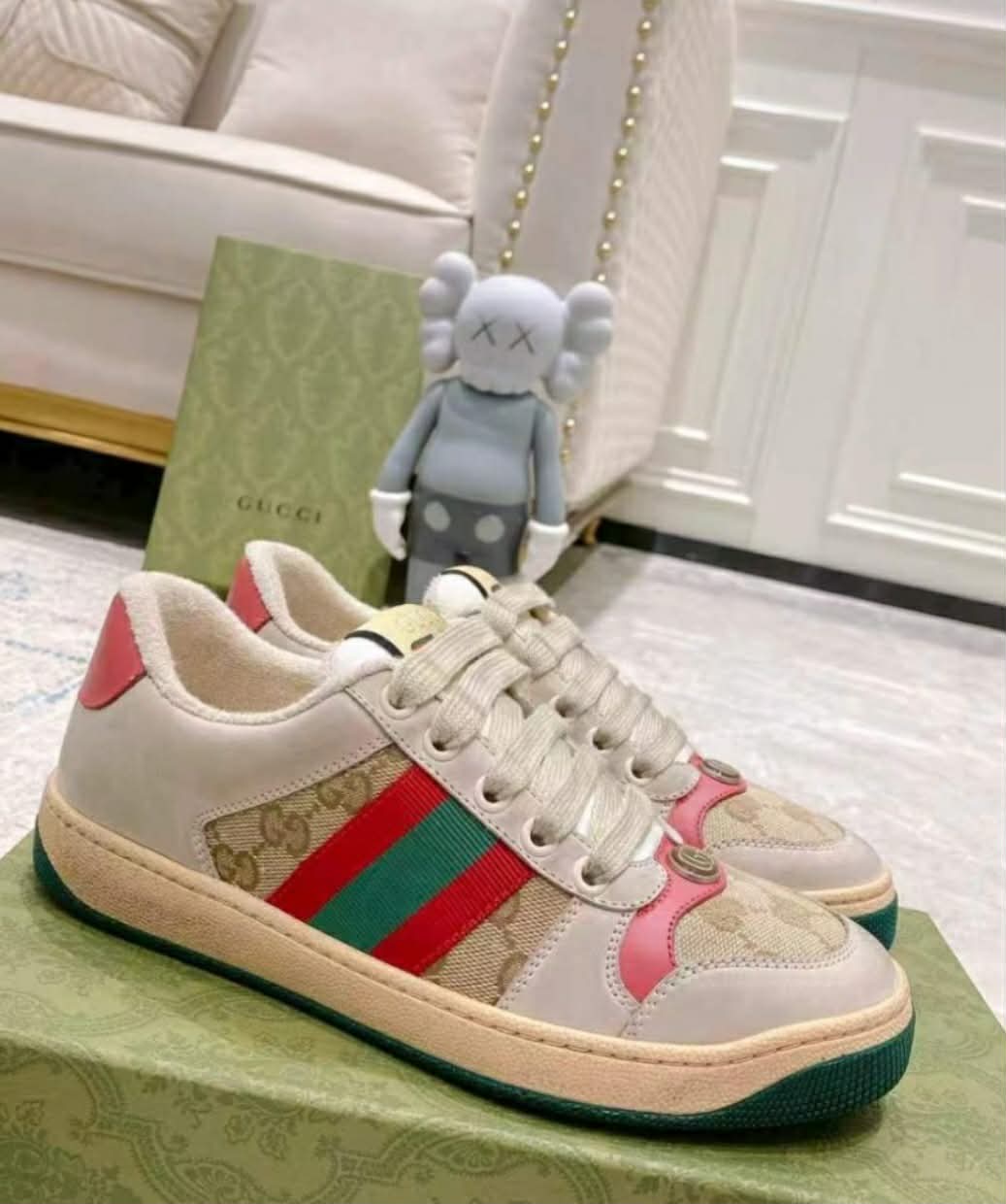 G logo tennis shoes