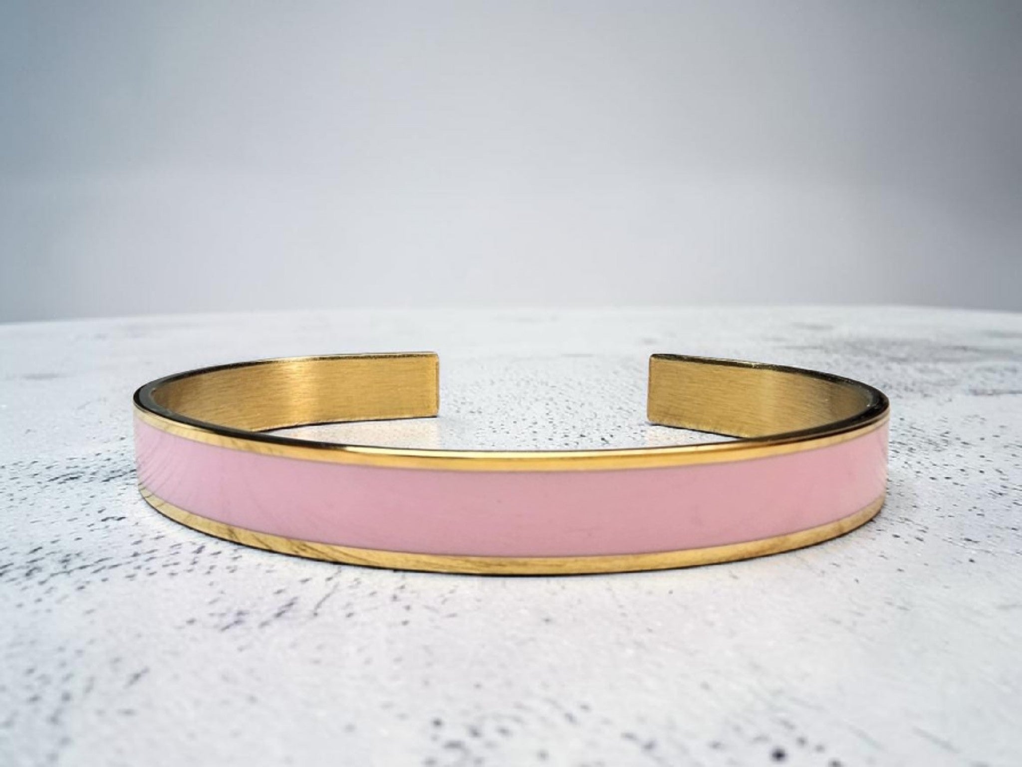 Pink and gold banded cuff bracelet