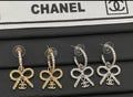 C Logo Gold plated Bow Earrings