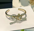 C Logo Bow Accent Cuff Bracelet