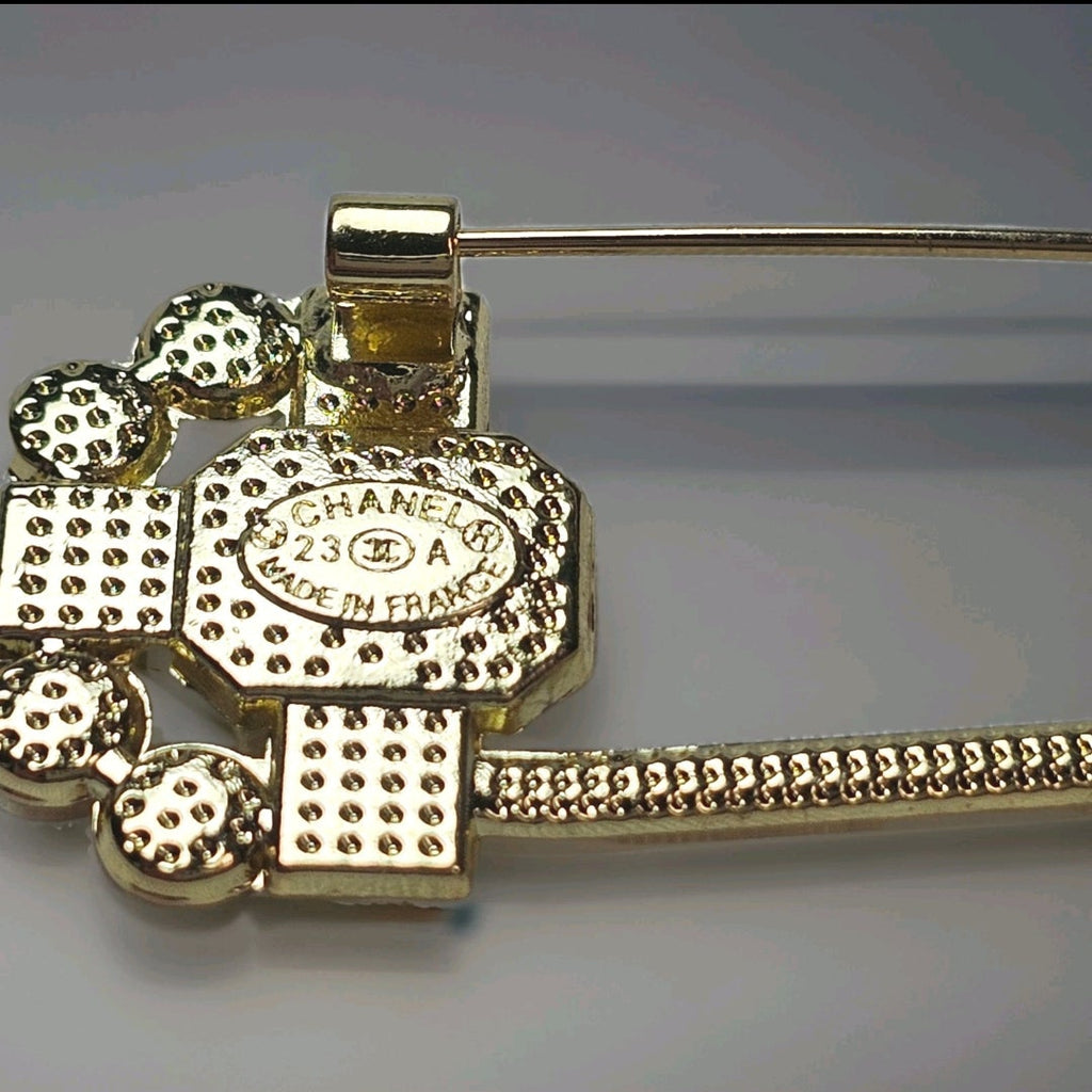 Chanel Gold Charm Safety Pin Brooch