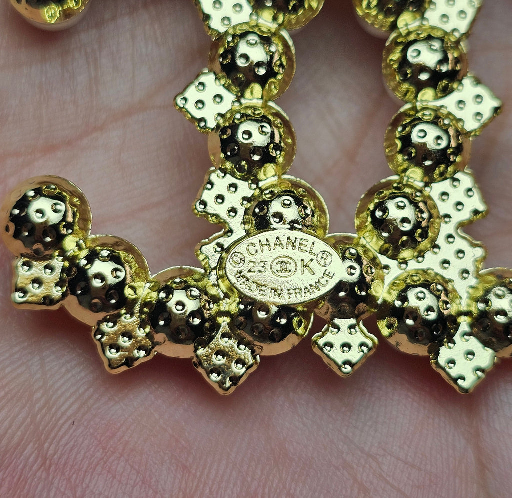 Gold and Continuous Pearl Charm Brooch