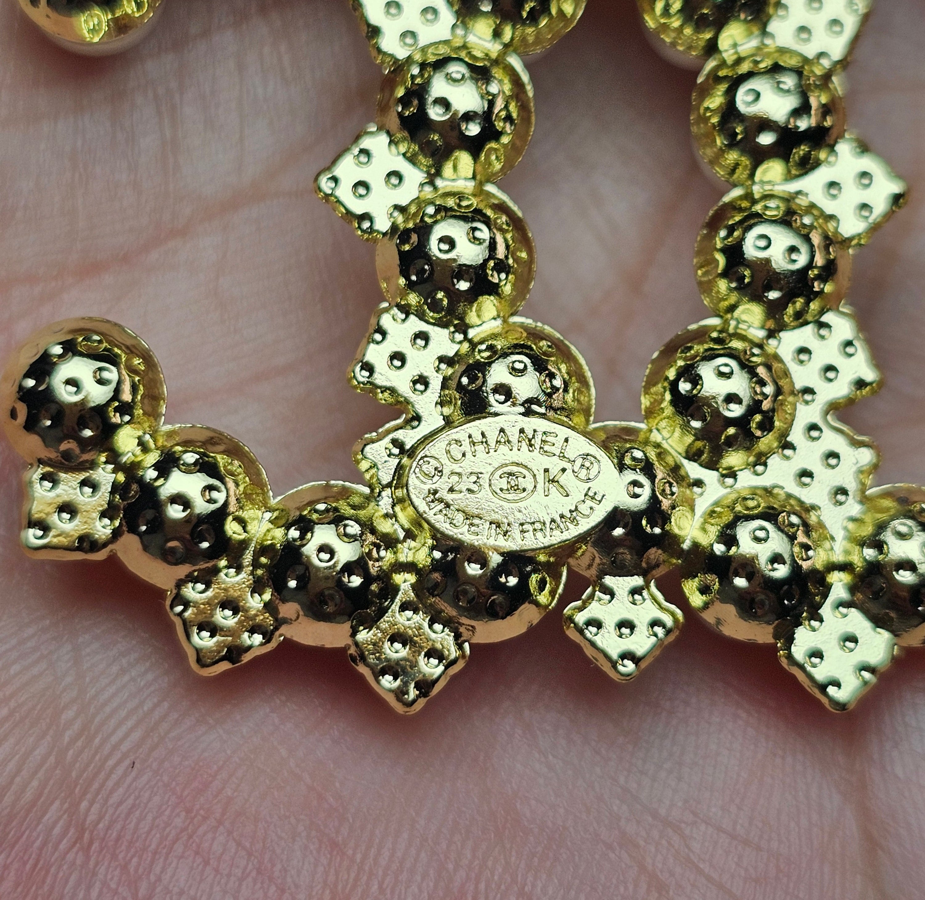 Gold and Continuous Pearl Charm Brooch