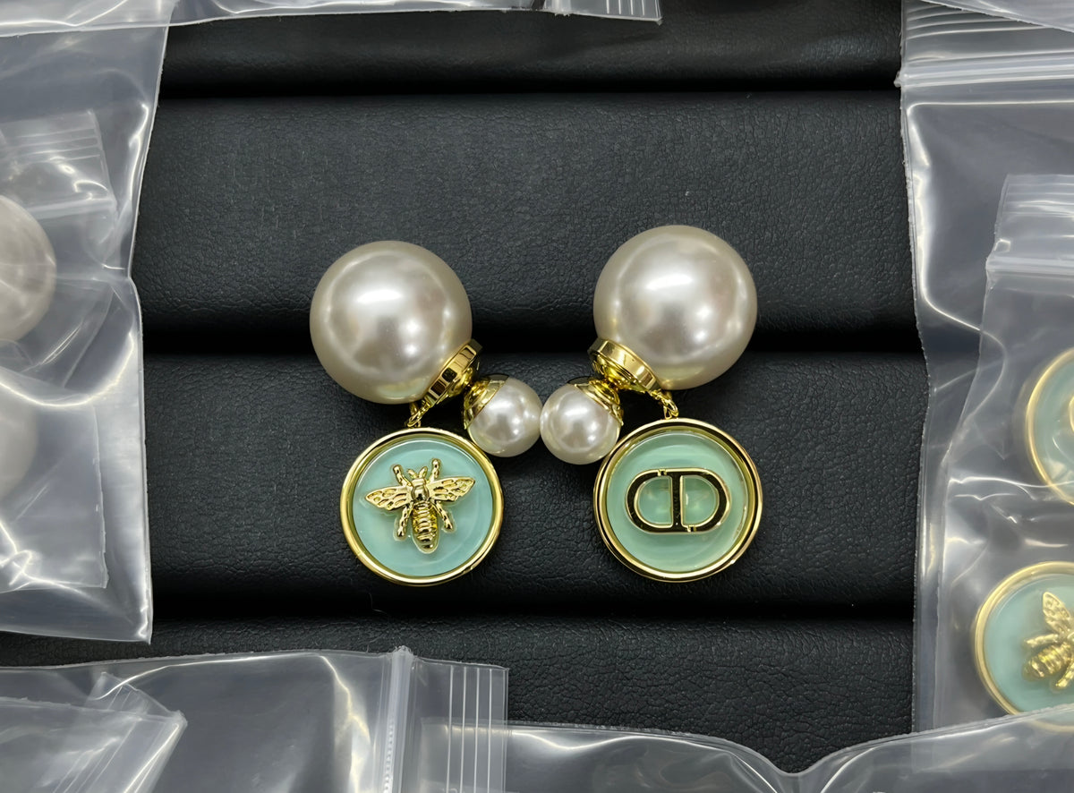 CD Logo Pierced Stud Earrings