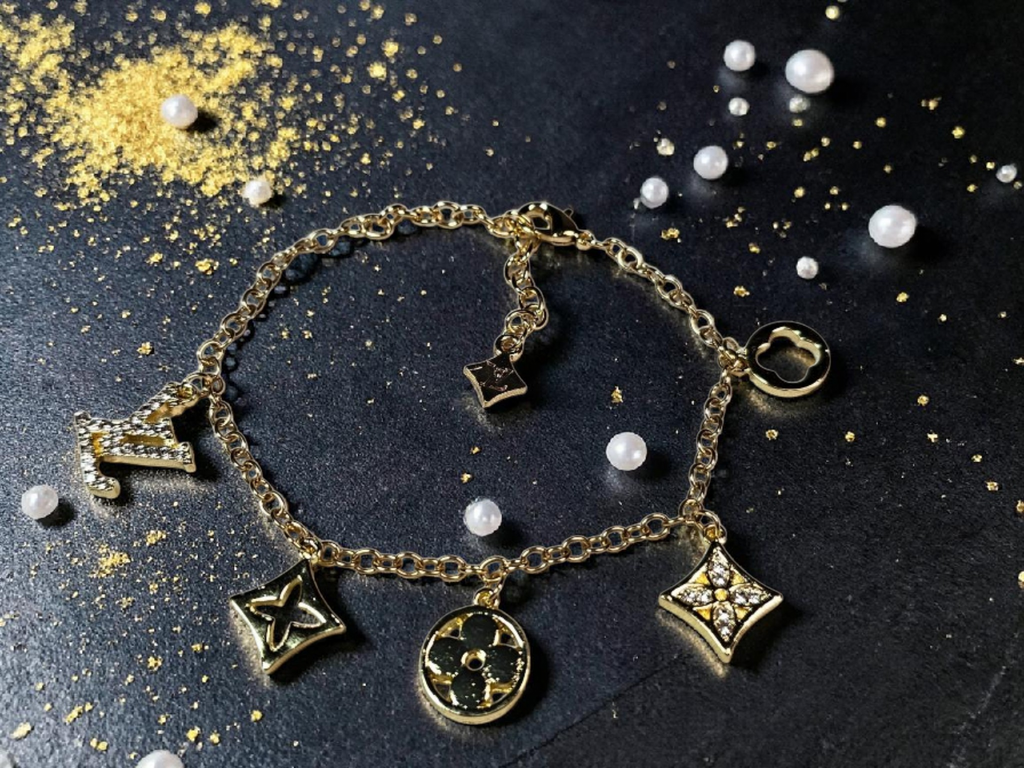 Logo charm bracelet with luxury multi-charm design