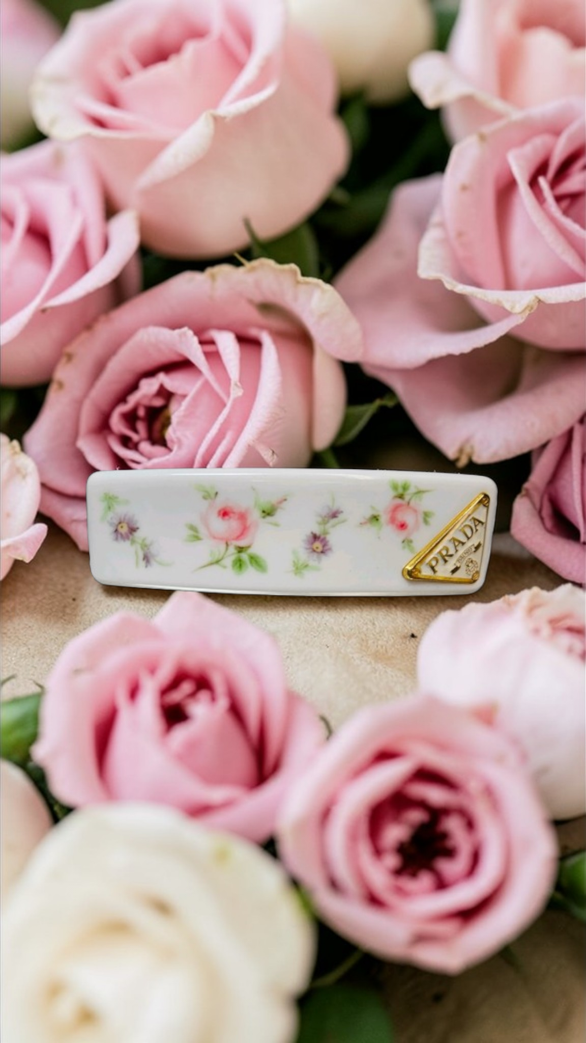 Prada White floral with Gold logo charm Hair Clip