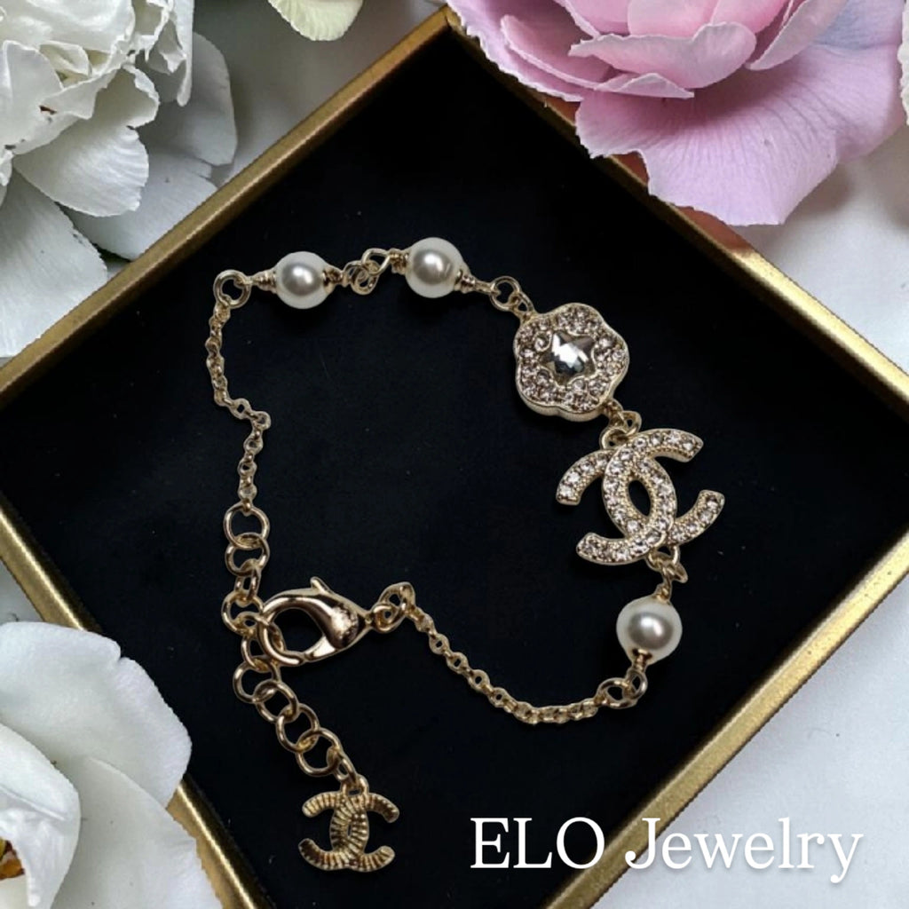 CC Logo Charms Golden Statement bracelet