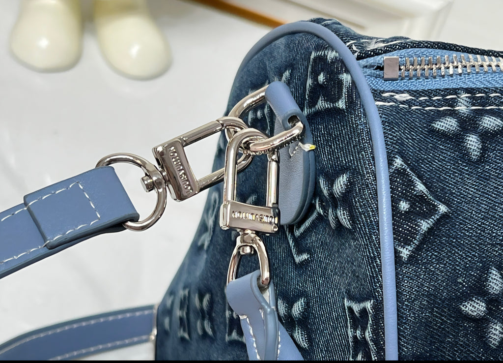 L Logo Deep Blue Denim Barrel Bag