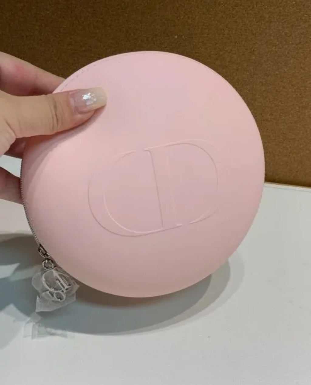 Dior Pink Round Silicone Beauty Case logo zipper pull