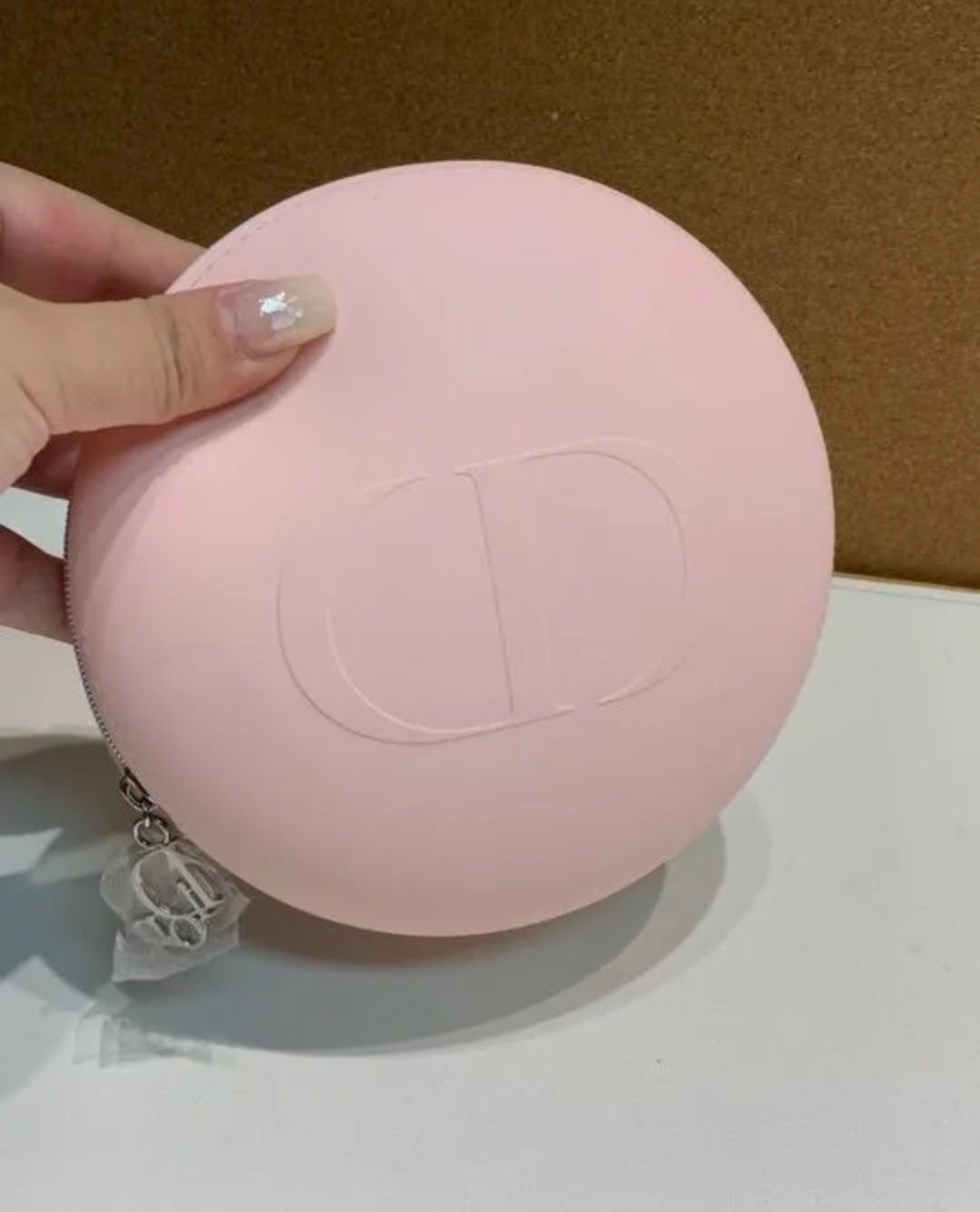 Dior Pink Round Silicone Beauty Case logo zipper pull