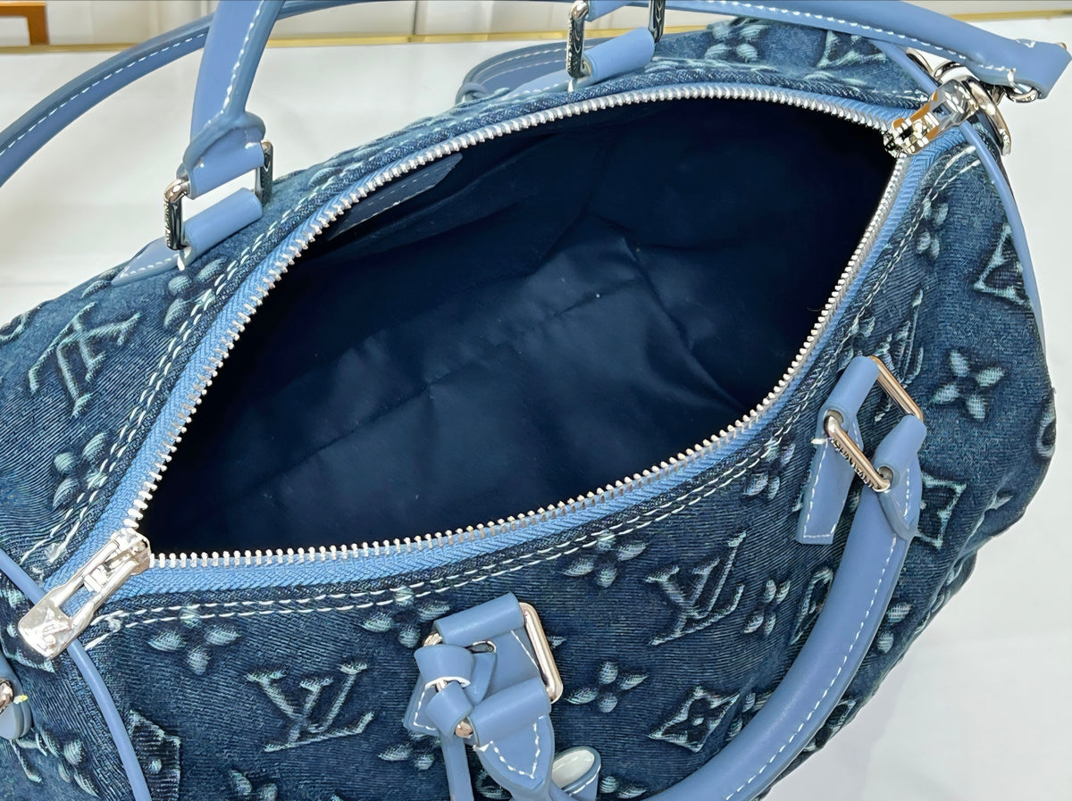 L Logo Deep Blue Denim Barrel Bag
