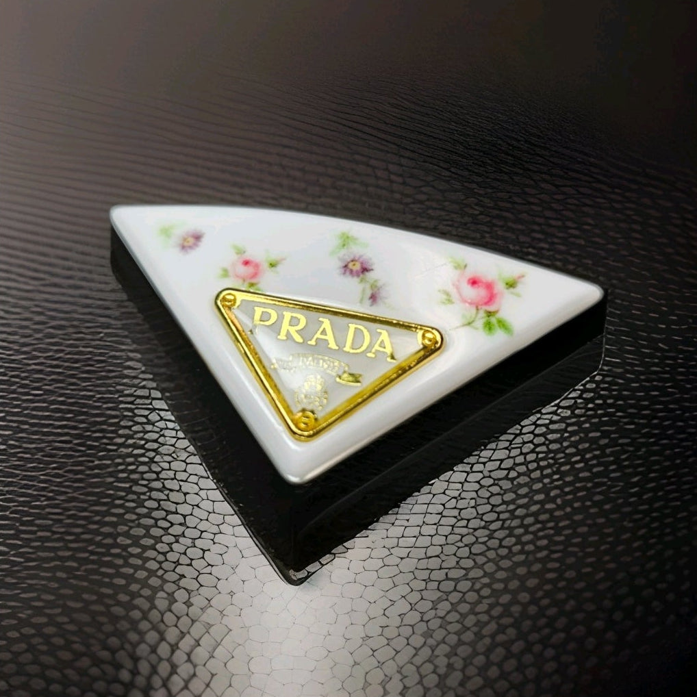 Prada Gold Logo charm White Floral Triangle Floral Hair Clip